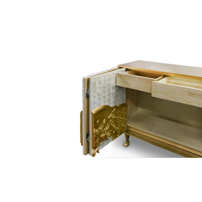 An exclusive chest of drawers with a beautiful golden peacock Luxury